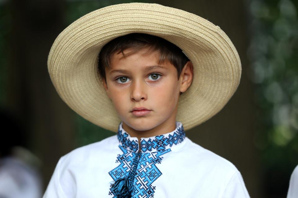 Anton Olenchin, 8, of Carlstadt, waits to perform with other dancers from the Passaic branch of the Ukrainian American Youth Association. Sunday, September 25, 2022