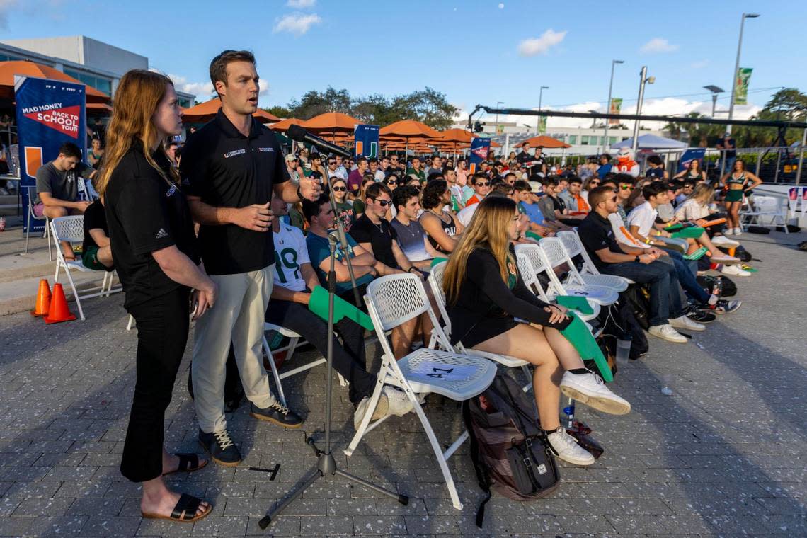 Students Trident Nottingham, 22, and Anna Whetzle, 23, pitch a stock option to CNBC’s Jim Cramer during a taping of his show ‘Mad Money’ at the University of Miami campus in Coral Gables, Florida, on Thursday, Feb. 2, 2023. The CNBC show was taped in front of a live audience.