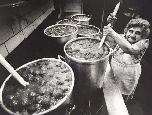 Up to her elbows in sauce. A June 1985 photo of Columbia Alsia, then 80, a longtime cook at St. Anthony's Italian Festival. Alsia, born in Naples, said she started cooking at 6 a.m. and made about 100 gallons of sauce and used close to 500 pounds of ground beef for the meatballs. When asked about her sauce, she said, "I can't let my secret out!"