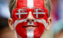 Denmark fan inside the stadium before the match. REUTERS/Michael Dalder