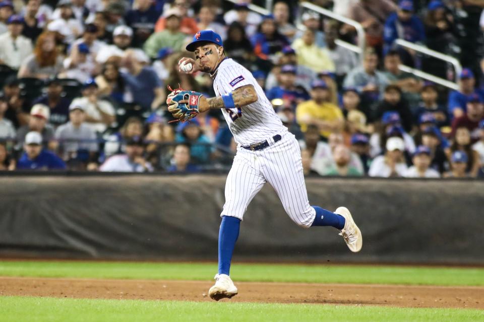 Sep 2, 2023; New York City, New York, USA;  New York Mets third baseman Mark Vientos (27) makes a running throw to first base in the sixth inning against the Seattle Mariners at Citi Field.