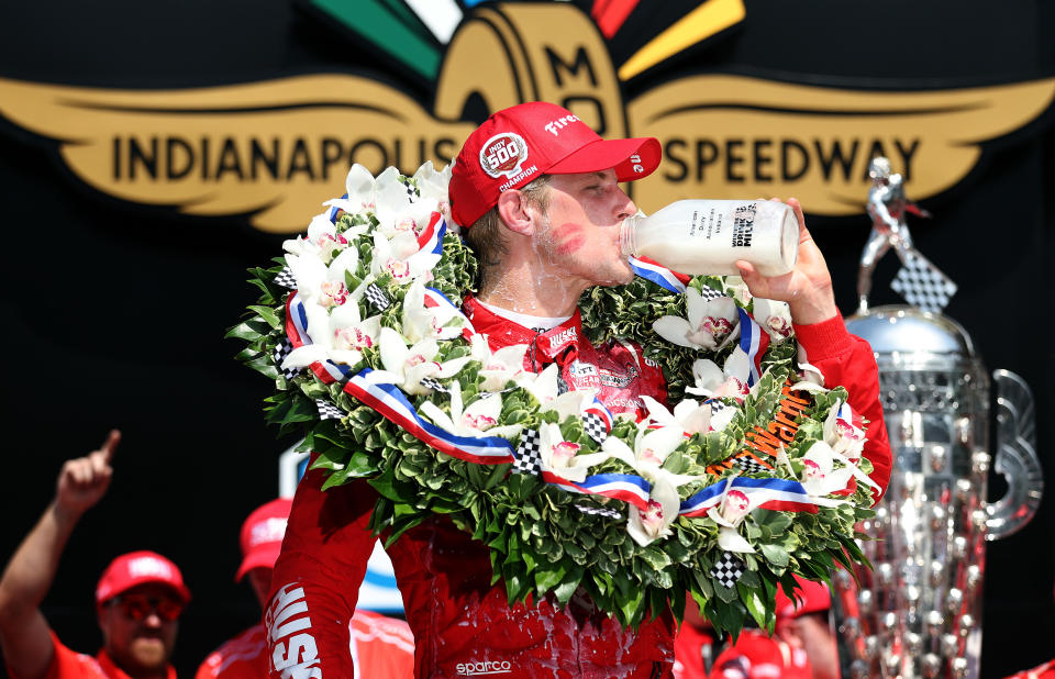 INDIANAPOLIS, INDIANA - MAY 29: Marcus Ericsson of Sweden, driver of the #5 Chip Ganassi Racing Honda, celebrates with milk in Victory Lane after winning the Indy 500 at Indianapolis Motor Speedway on May 29, 2022 in Indianapolis, Indiana.  (Photo by Jamie Squire/Getty Images)