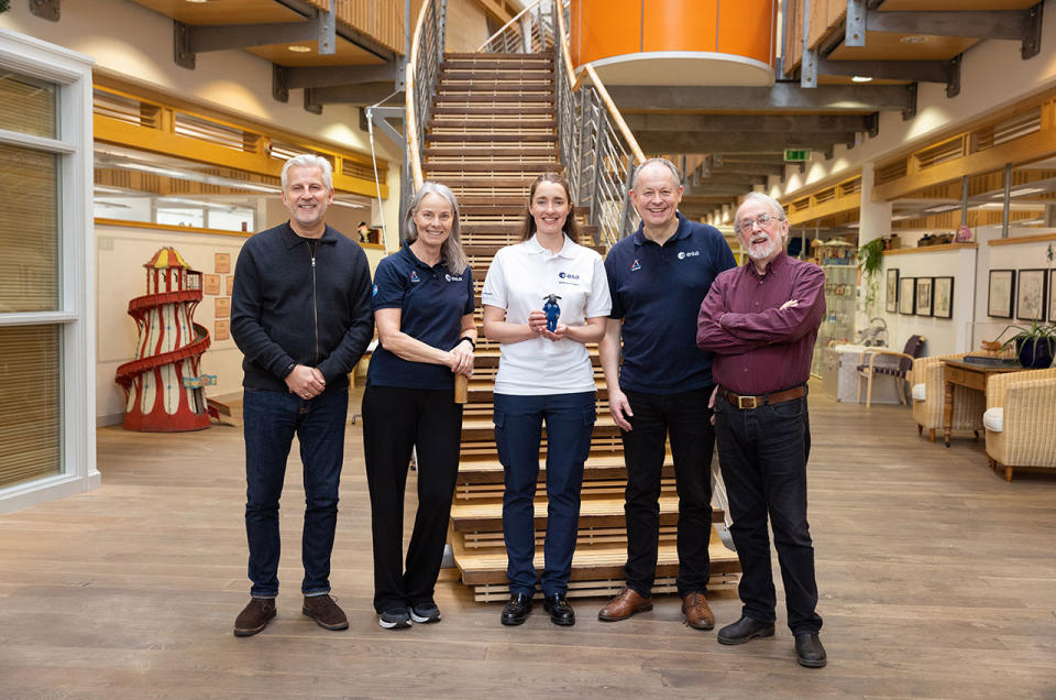 European Space Agency (ESA) astronaut candidate Rosemary Coogan (at center) holds up her fellow ESA astronaut Shaun the Sheep for photo with Aardman managing director Sean Clarke (at left), ESA communication officer Rosita Suenson, ESA director of human and robotic exploration David Parker and Ardman co-founder and creative director Peter Lord at Ardman Animations' studio in Bristol, UK on March 29, 2023.