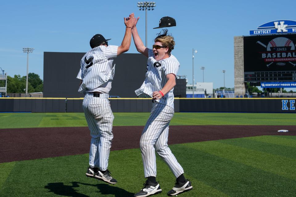 Pleasure Ridge Park players celebrate their 4-1 win over McCracken County on Saturday in Lexington for the state baseball championship.