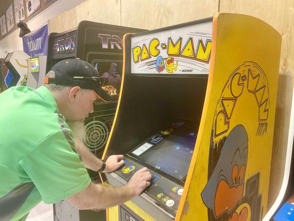 Fox Hamilton focuses on Pac-Man while competing in the Arcade Game Gauntlet on Monday. Hamilton was the winner of the tournament. Sonora Slater