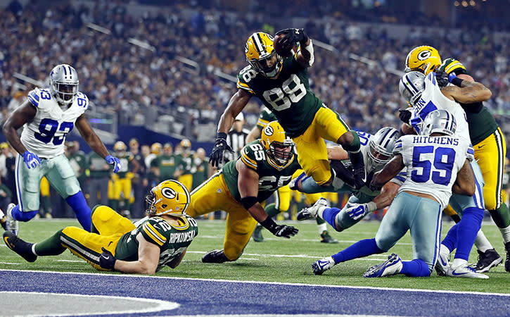 Jan 15, 2017; Arlington, TX, USA; Green Bay Packers running back Ty Montgomery (88) dives for a touchdown during the second quarter against the Dallas Cowboys in the NFC Divisional playoff game at AT&T Stadium. Mandatory Credit: Tim Heitman-USA TODAY Sports