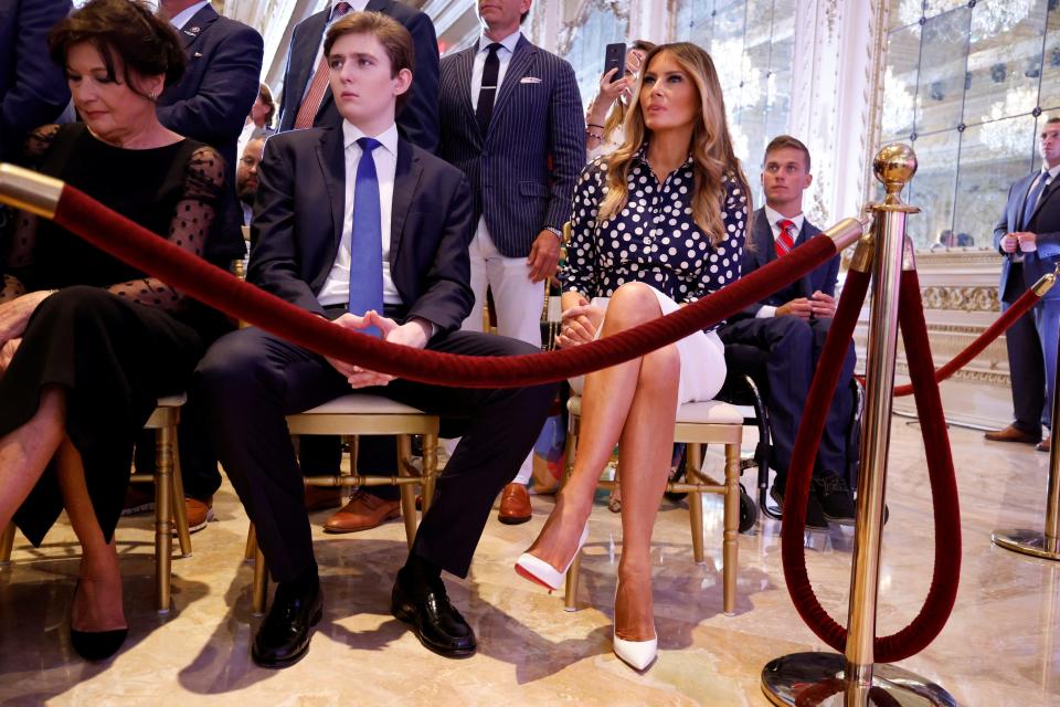 Melania Trump sits in the front row with her son, Barron Trump, and her mother, Amalija Knavs, as Donald Trump announces that he will once again run for president in the 2024 US presidential election during an event at his Mar-a-Lago estate in Palm Beach, Florida, November 15, 2022.