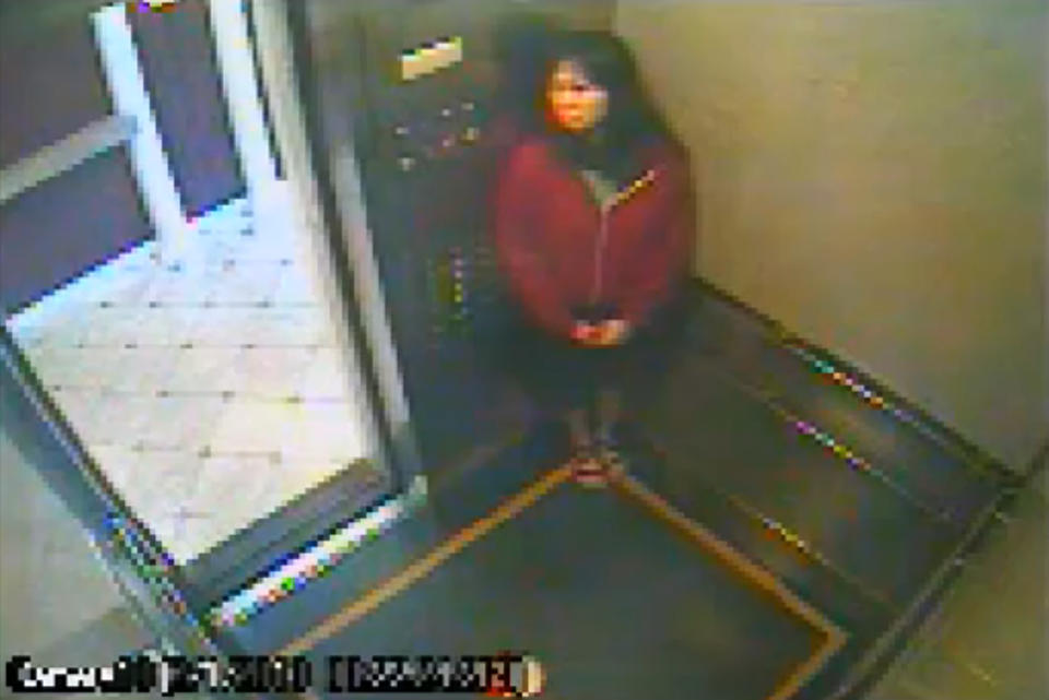 This still image taken from a security video was released on Feb. 13, 2013, by the Los Angeles Police Department in connection with the search for 21-year-old missing Canadian tourist Elisa Lam. In this image, a woman believed to be Lam appears to hide in an elevator in the Cecil Hotel in downtown Los Angeles on Thursday, Jan. 31, the last day she was seen alive. A maintenance worker at the hotel found Lam's body in a water cistern on the building's roof on Feb. 19, more than two weeks after she had gone missing. (AP Photo/Los Angeles Police Department)
