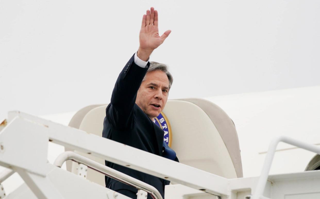 US Secretary of State Antony Blinken waves as he boards a plane for Israel at Andrews Air Force Base, Maryland - REUTERS