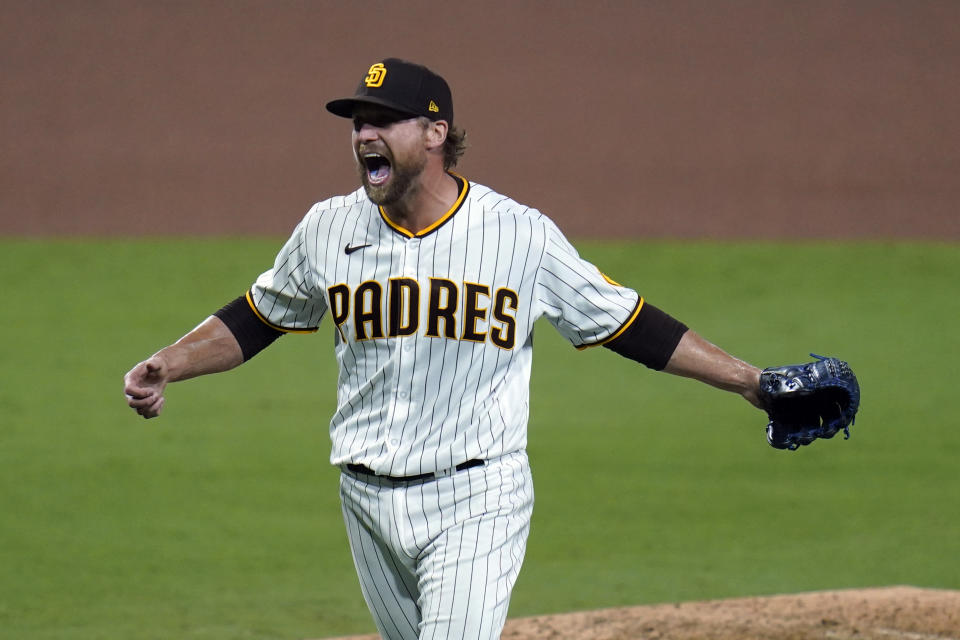 San Diego Padres relief pitcher Trevor Rosenthal celebrates after the Padres defeated the St. Louis Cardinals 4-0 in Game 3 of a National League wild-card baseball series Friday, Oct. 2, 2020, in San Diego. The Padres advanced to the NL Division Series. (AP Photo/Gregory Bull)