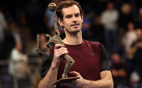 Andy Murray of Britain poses with the trophy after winning the European Open final tennis match in Antwerp, Belgium, Sunday, Oct. 20, 2019. Murray defeated Stan Wawrinka of Switzerland 3-6/6-4/6-4 - Credit: AP