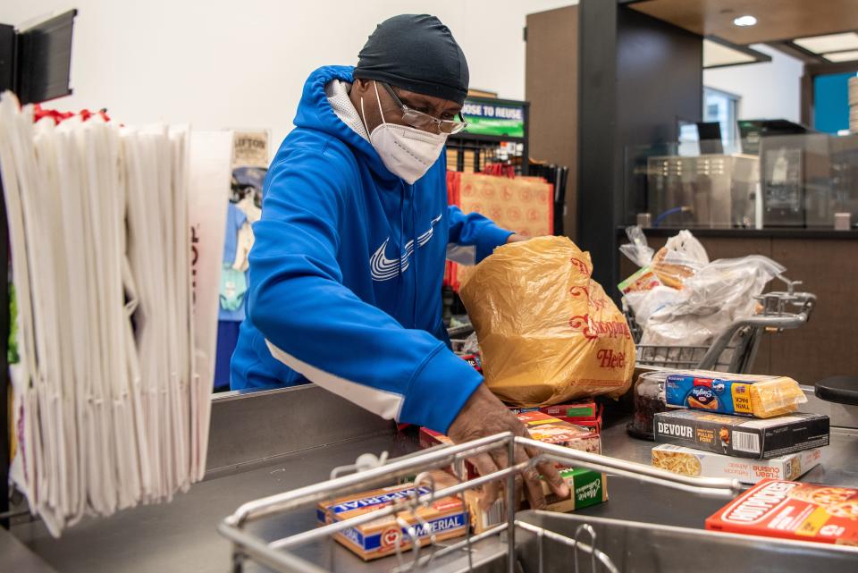 Ronald Joseph Sr. from Paterson, NJ packs groceries into disposable bags he brought to Stop & Shop in Clifton on the first day of the plastic bag ban on Wednesday May 4, 2022.