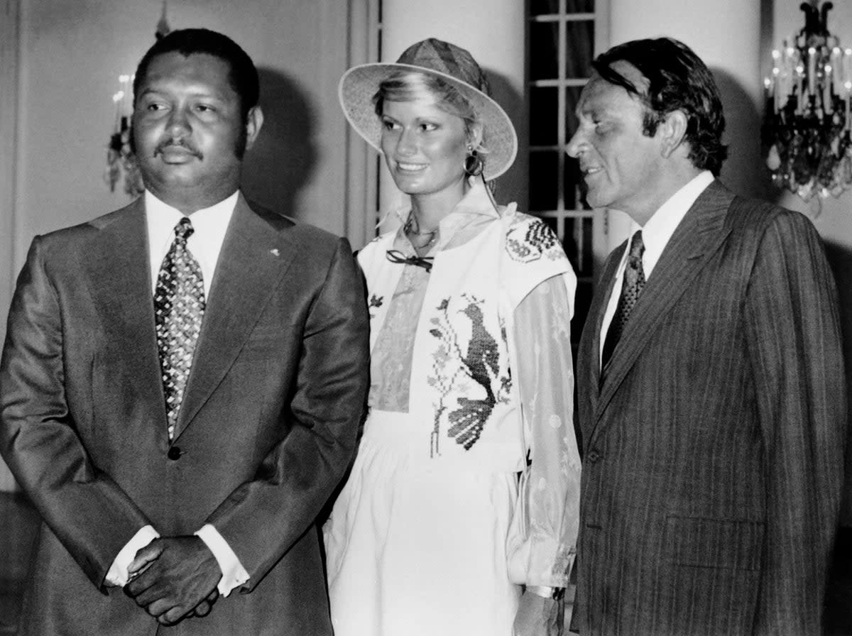 Richard Burton  poses with president of Haiti Jean-Claude Duvalier and his wife British actress Suzy Miller (AFP/Getty)