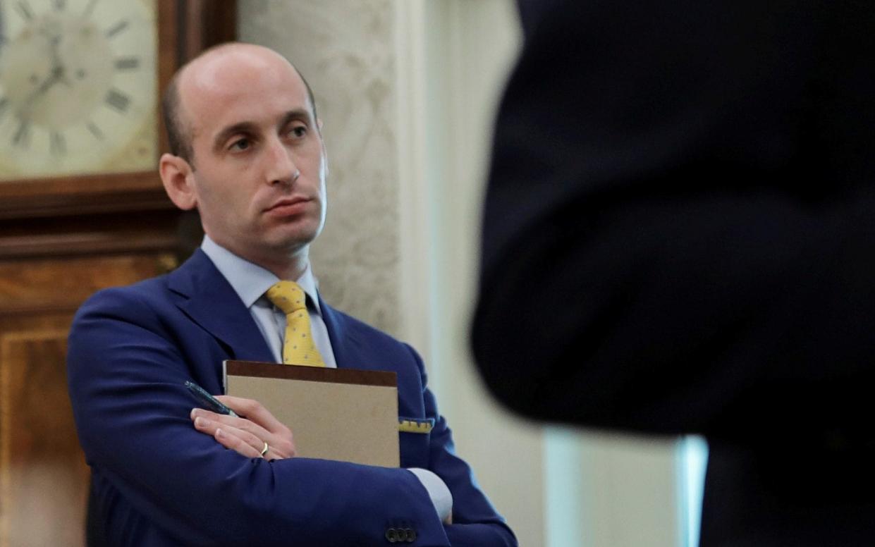 Stephen Miller has been behind the administration's aggressive curb on immigration  - Carlos Barria /Reuters