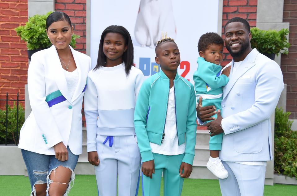 Actor Kevin Hart (R), his wife Eniko Parish (L) and children Hendrix, Heaven and Kenzo walk the carpet at the 'The Secret Life of Pets 2' premiere in Westwood, California, on June 2, 2019.