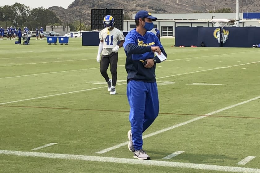 Los Angeles Rams defensive coordinator Brandon Staley watches football practice at the team's training.