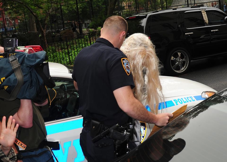 NEW YORK, NY - MAY 24: Actress Amanda Bynes departs Manhattan Central Booking after being arrested on May 23 2013 for alleged charges of reckless endangerment, tampering with evidence and criminal possession of marijuana at Manhattan Criminal Court on May 24, 2013 in New York City. (Photo by Alo Ceballos/Getty Images)