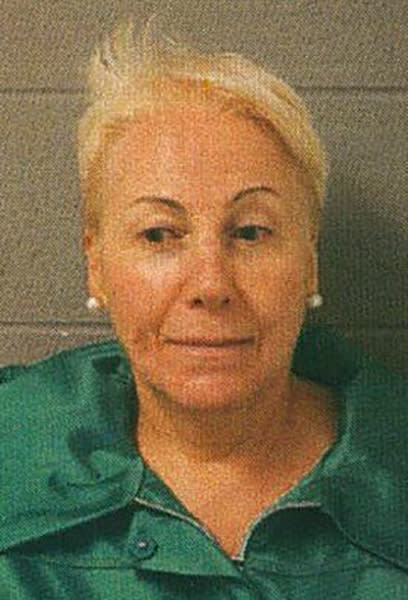 FILE - This booking photo provided by the Winnetka Police Department, shows Irene Donoshaytis, 65, who was charged with felony hate crime on Sept. 2, 2020, after she aggressively confronted Otis Campbell and two other Black people who were bicycle riding near a pier in Winnetka, Ill. Donoshaytis has been sentenced to probation after pleading guilty to a lesser charge. The felony hate crime charge Donoshaytis had faced in Cook County was amended Wednesday, Oct. 19, 2022, to a misdemeanor battery under a plea agreement. (Winnetka Police Department/Chicago Tribune via AP, File)