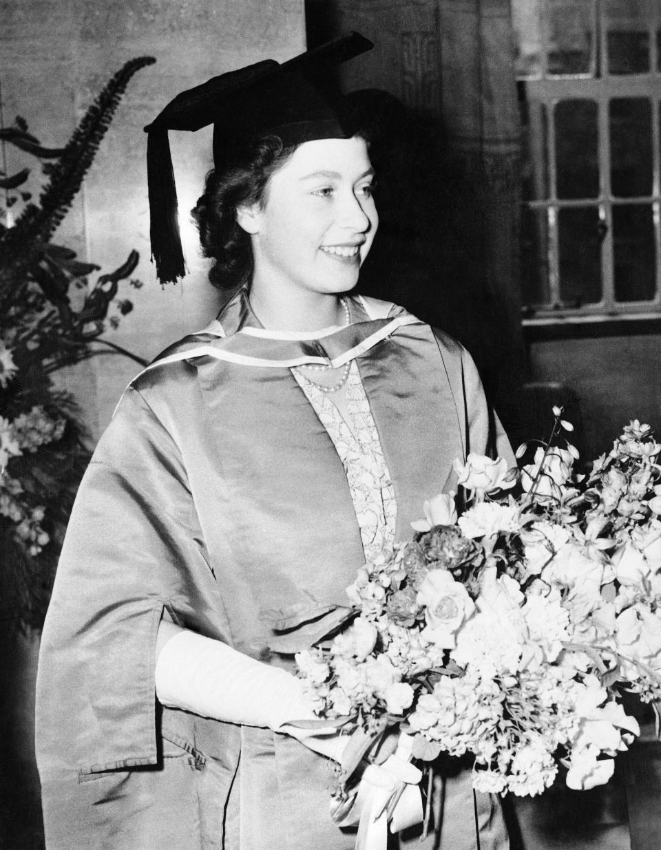 Queen Elizabeth in a graduation cap and gown in 1946