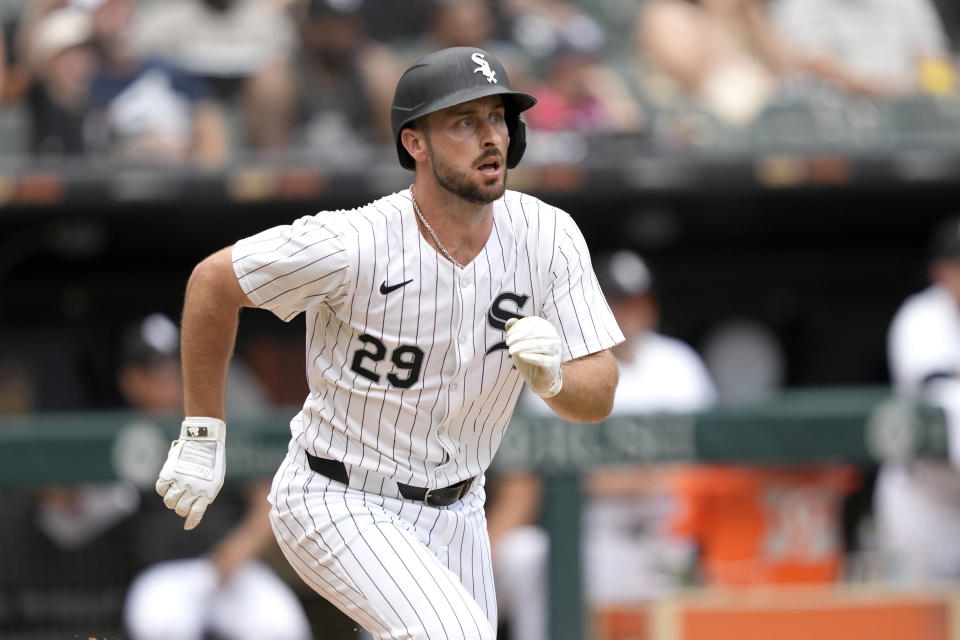 Chicago White Sox's Paul DeJong watches his RBI single during the eighth inning of a baseball game against the Colorado Rockies, Saturday, June 29, 2024, in Chicago. (AP Photo/Charles Rex Arbogast)