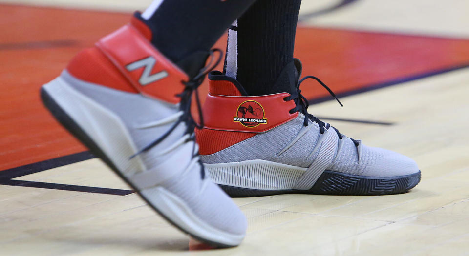 Kawhi Leonard has been involved in the creative process of his signature shoe, including this Jurassic Park-themed design. (Photo by Vaughn Ridley/Getty Images)