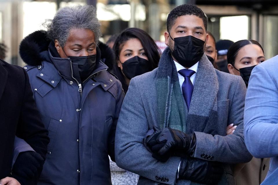 Jussie Smollett departs with his mother Janet, from the Leighton Criminal Courthouse, Dec. 8, 2021, in Chicago, after Cook County Judge James Linn gave the case to jury.