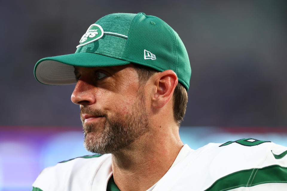 EAST RUTHERFORD, NEW JERSEY - AUGUST 26: Aaron Rodgers #8 of the New York Jets looks on from the sideline during a preseason game against the New York Giants at MetLife Stadium on August 26, 2023 in East Rutherford, New Jersey. (Photo by Mike Stobe/Getty Images)