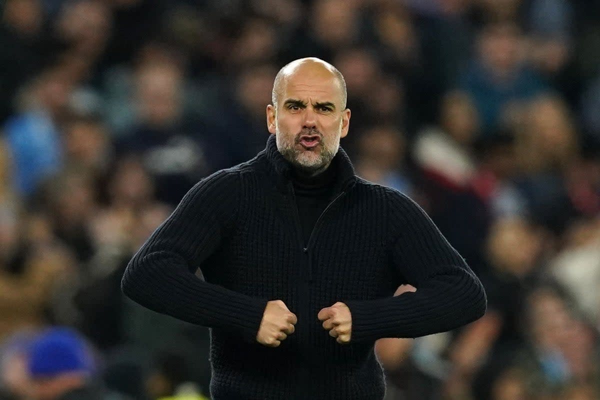Pep Guardiola said Manchester City’s win over Arsenal put the title fight in their hands (Martin Rickett/PA) (PA Wire)
