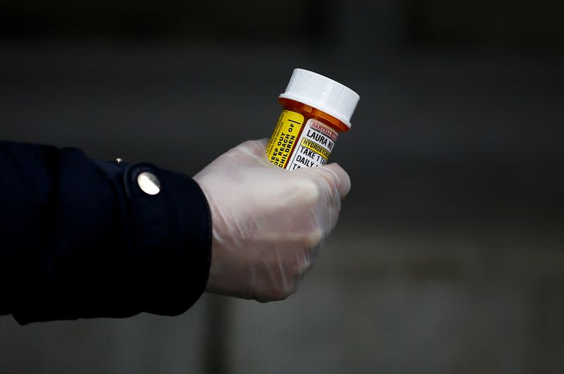 Laura Ng is pictured with her hydroxychloroquine prescription during the coronavirus disease (COVID-19) outbreak in Seattle