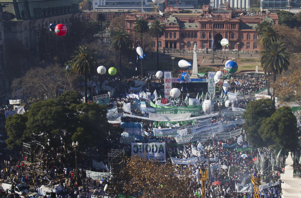 Demonstrators fill Plaza de Mayo in front of the government palace in Buenos Aires, Argentina, Wednesday, June 27, 2012. A strike and demonstration called by union leader Hugo Moyano demands steps that would effectively reduce taxes on low-income people, among other measures. (AP Photo/Eduardo Di Baia)