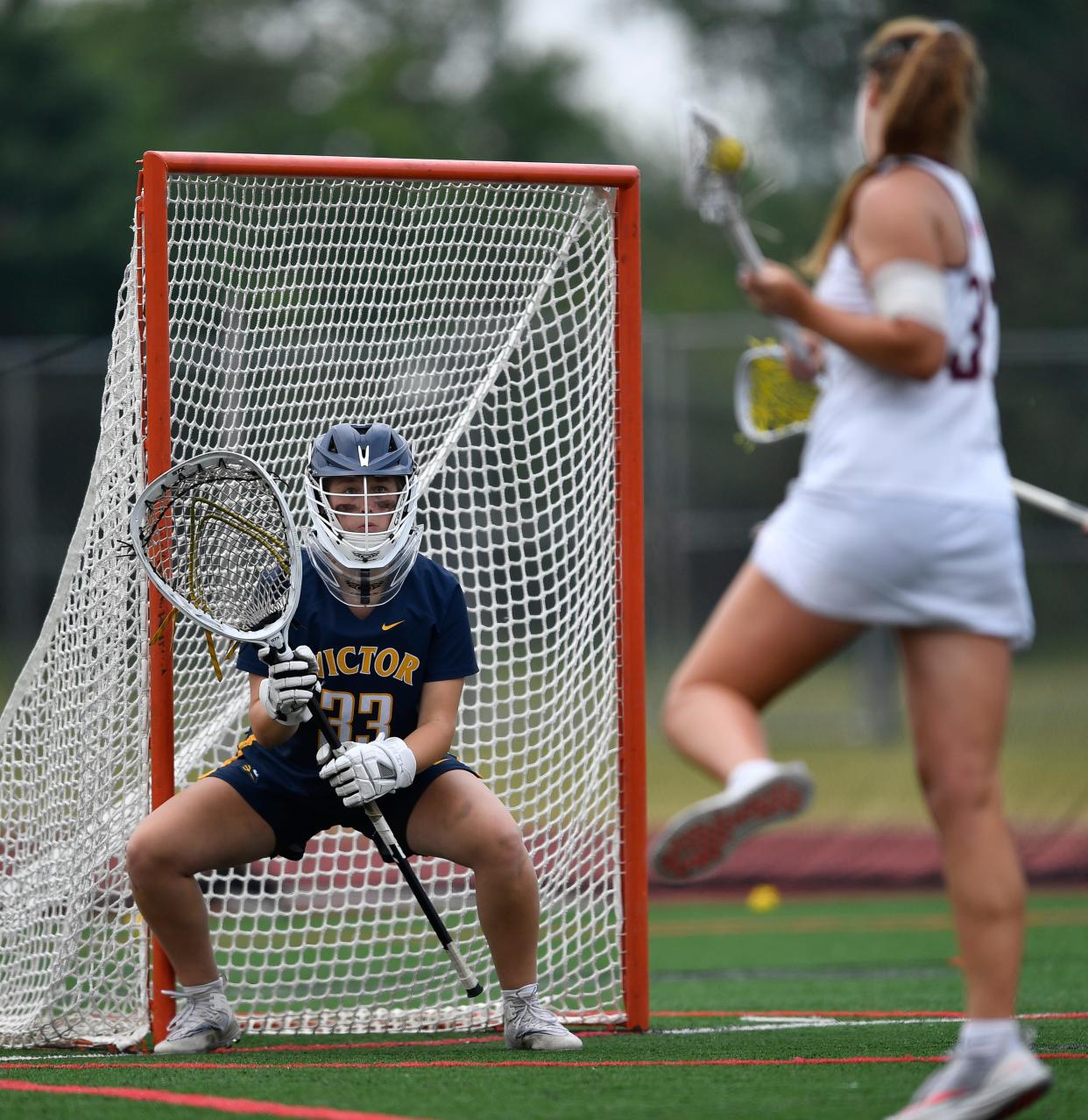 Victor goalie Maggie Allen gets in position before making a save during the NYSPHSAA Girls Lacrosse Championships Class B final in Cortland, N.Y., Saturday, June 10, 2023. Victor won the Class B title with an 8-6 win over Garden City.