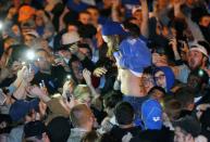 University of Kentucky fans and students take to the streets after the University of Connecticut defeated Kentucky in the NCAA Men's National Basketball Championship near the university campus in Lexington, Kentucky, April 7, 2014. REUTERS/ John Sommers II (UNITED STATES - Tags: CIVIL UNREST SPORT BASKETBALL)