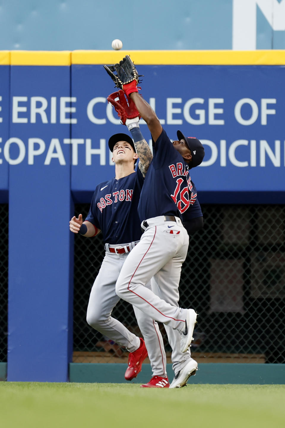 Boston Red Sox right fielder Jackie Bradley Jr. (19) makes a catch in front of center fielder Jarren Duran for the out on Cleveland Guardians' Jose Ramirez during the third inning of a baseball game Friday, June 24, 2022, in Cleveland. (AP Photo/Ron Schwane)