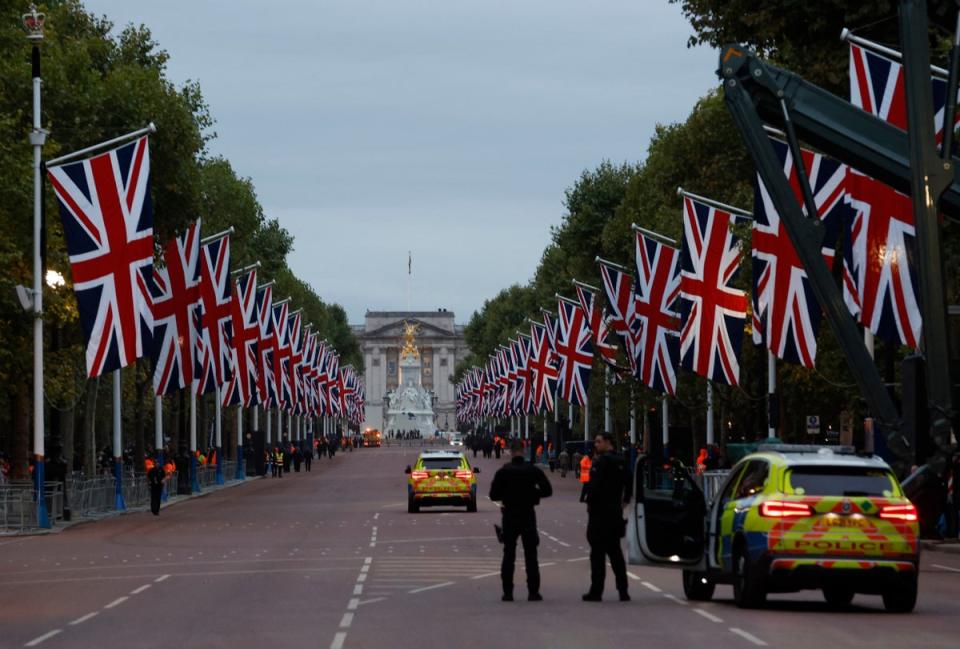 Police officers are seen on The Mall, on the day of the state funeral and burial of Britain’s Queen Elizabeth (REUTERS)