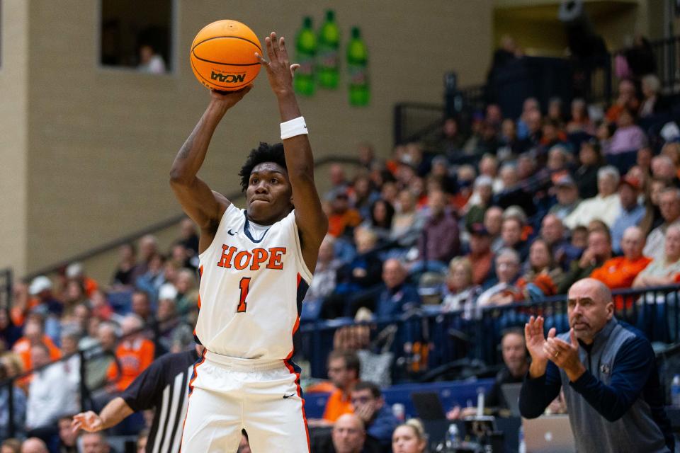 Hope's Marcus Wourman lobs up a three from deep during a game against UW Stout Friday, Nov. 11, 2022, at DeVos Fieldhouse. 