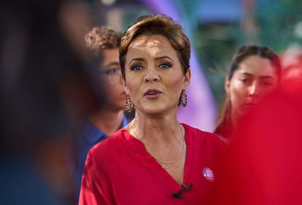 Arizona Republican gubernatorial nominee Kari Lake gives a news conference after casting her ballot in Phoenix on Nov. 8, 2022.