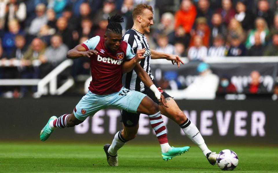 West Ham United's Mohammed Kudus in action with Newcastle United's Dan Burn