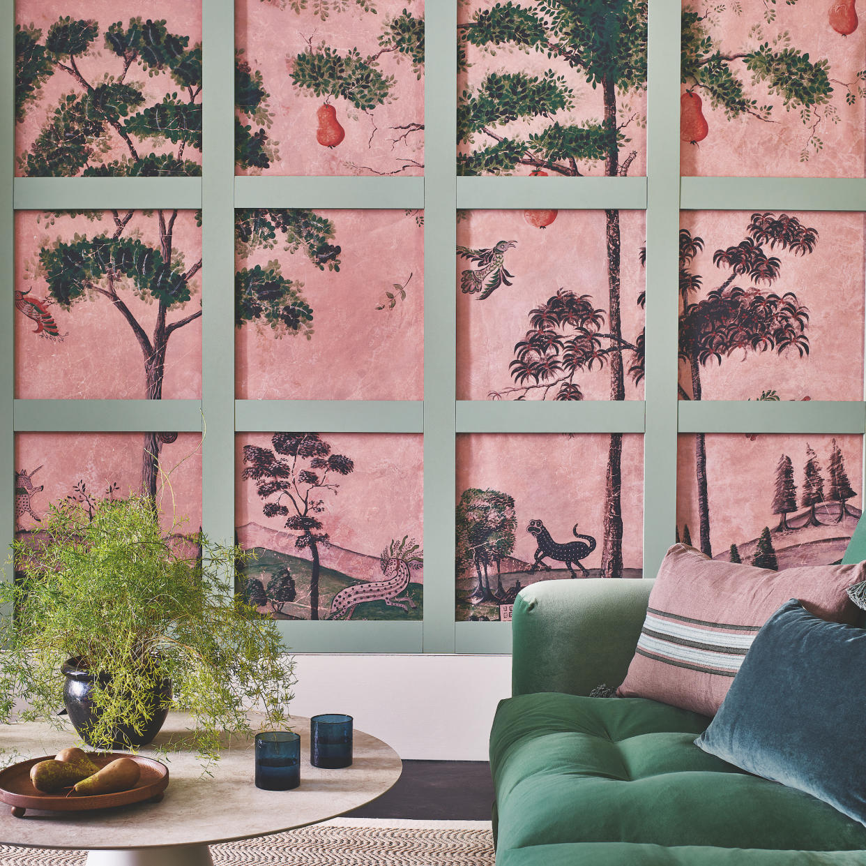  Room with feature wall armchair and potted plant. 