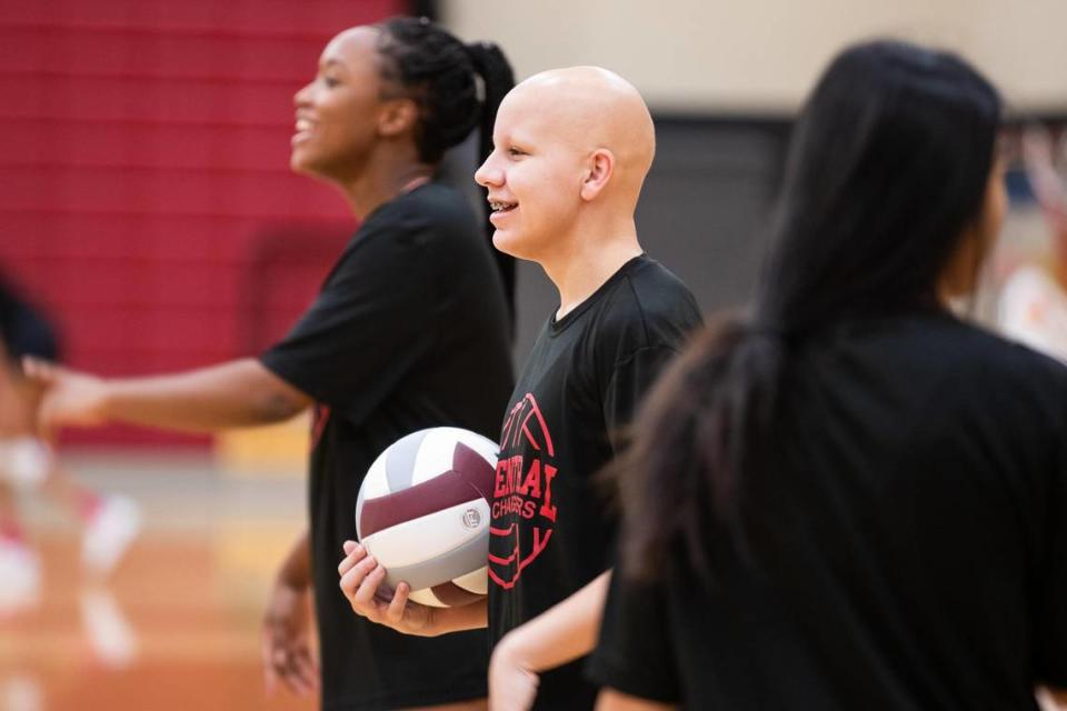 Central volleyball player Allison Montoya, center, is in line during practice Sept. 29, 2021, in Keller. Montoya has alopecia, which caused all her hair to fall out.