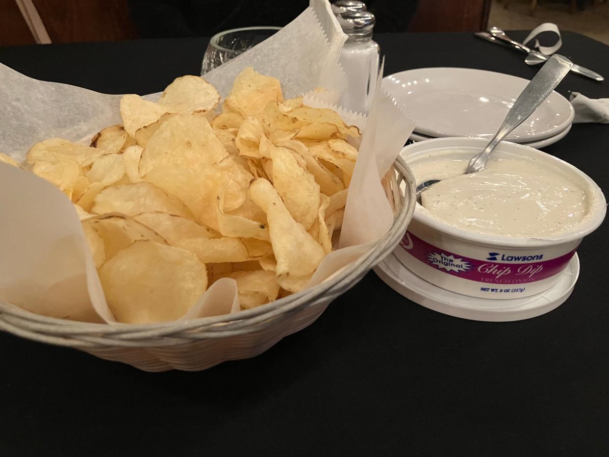 Your eyes do not deceive you, that's a whole container of Lawson's famous chip dip next to a big ol' basket of Gold'n Krisp Chips.