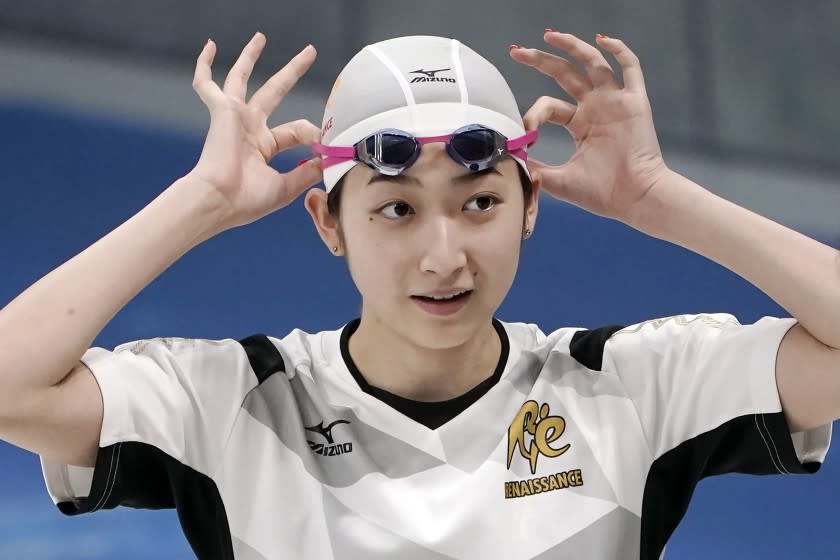 Japanese swimmer Rikako Ikee prepares to swim during a demonstration.