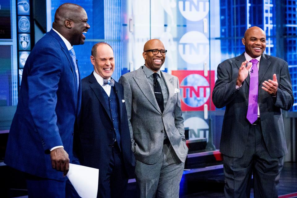 Ernie Johnson (second from left) shares a laugh with other members of his Inside the NBA team on TNT: (from left), Shaquille O'Neal, Kenny Smith and Charles Barkley.