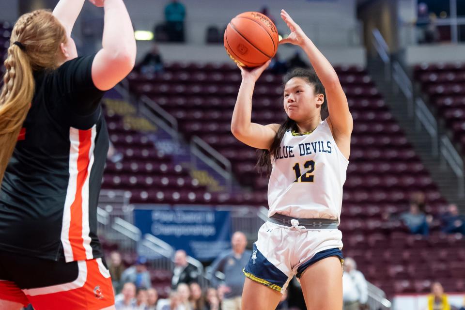 Greencastle-Antrim's Mia Libby shoots a step-back jumper during the District 3 Class 5A girls' basketball championship against York Suburban at the Giant Center on March 2, 2023, in Derry Township. The Blue Devils won, 44-30. 