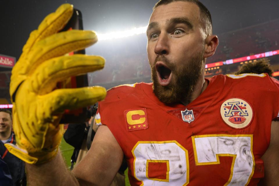Chiefs tight end Travis Kelce does a social media post after a win over the Jacksonville Jaguars in an AFC divisional playoff game, Saturday, Jan. 21, 2023 in Kansas City, Mo.