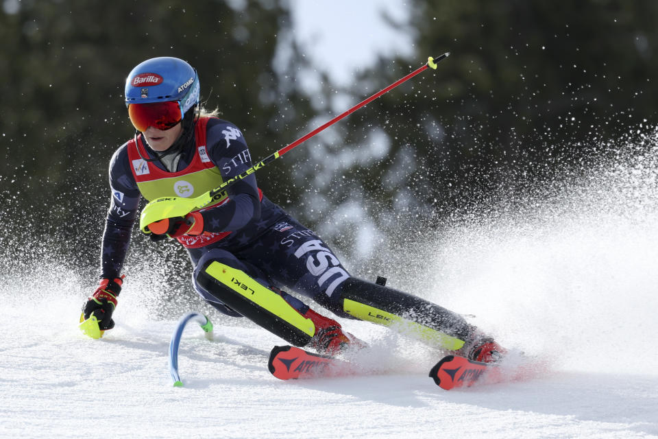 FILE - United States' Mikaela Shiffrin competes in a women's World Cup slalom race, in Soldeu, Andorra, Saturday, March 18, 2023. Amid growing environmental concerns surrounding the sport, the Alpine skiing World Cup season starts on a glacier in Austria this weekend with more races scheduled until March than ever before: 90, evenly divided between women and men. American star Mikaela Shiffrin and Swiss standout Marco Odermatt are regarded strong favorites to defend their overall titles from last year. (AP Photo/Alessandro Trovati, File)