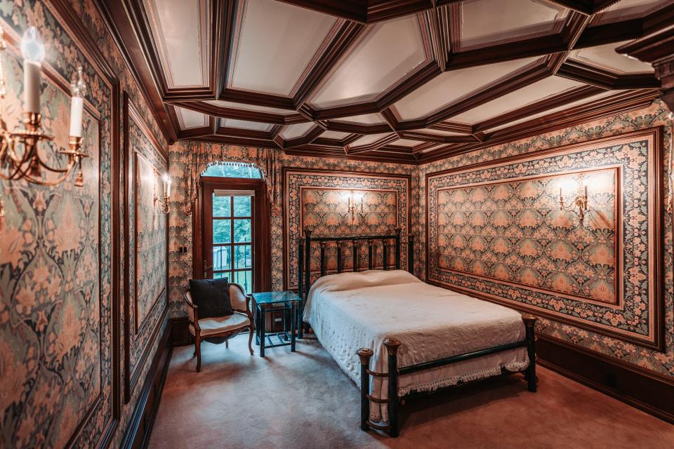 Another bedroom in LeBlanc Castle, which is inspired by Middle Age Scottish Baronial style.