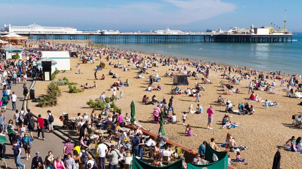 Weekenders bask in the sun at Brighton beach (Visit Brighton)