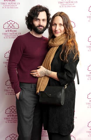 <p>Ilya S. Savenok/Getty </p> Penn Badgley and his wife Domino Kirke in 2023