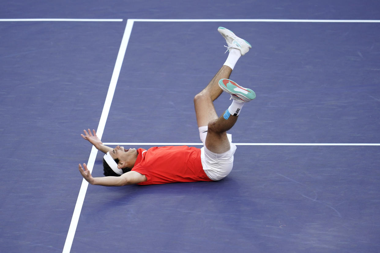 Taylor Fritz reacts after defeating Rafael Nadal, of Spain, during the men's singles finals at the BNP Paribas Open tennis tournament Sunday, March 20, 2022, in Indian Wells, Calif. Fritz won 6-3, 7-6. (AP Photo/Marcio Jose Sanchez)