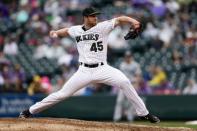 Jul 15, 2018; Denver, CO, USA; Colorado Rockies relief pitcher Scott Oberg (45) pitches in the eighth inning against the Seattle Mariners at Coors Field. Mandatory Credit: Isaiah J. Downing-USA TODAY Sports